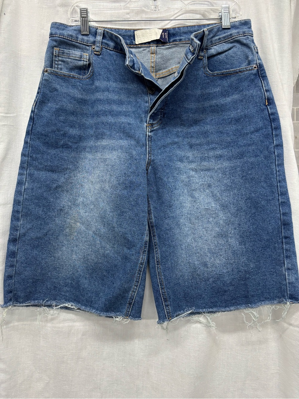 High-Rise Blue Denim Jean Shorts with Frayed Hem